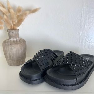 Abata Black studded slip ons
